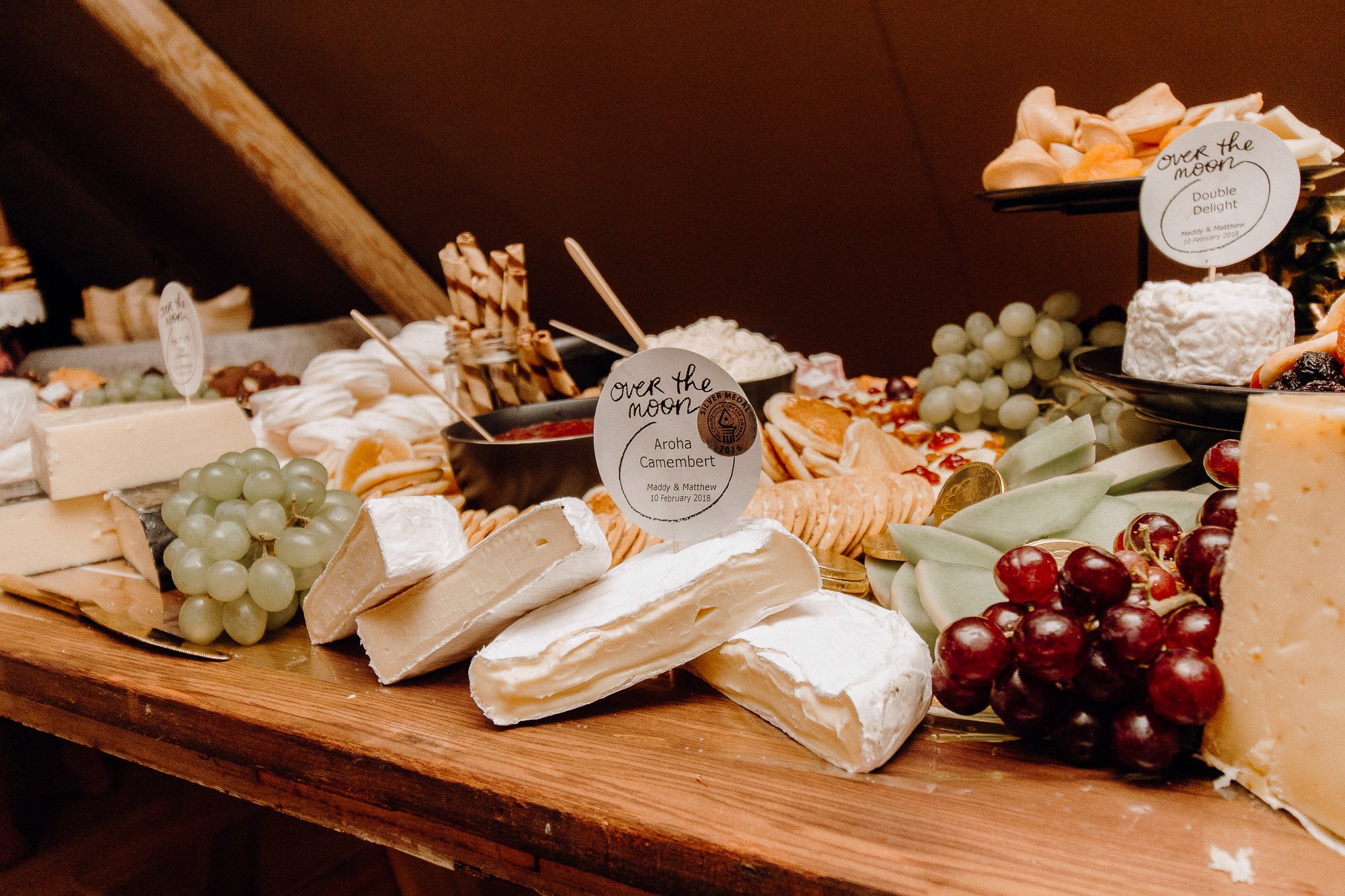 Wedding Photography Of Grazing Table Ideas 003, filled with cheese, crackers, fresh fruits and more cheese